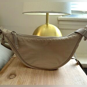 Uniqlo ultra mini round bag